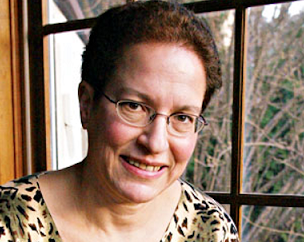 Shelley Frisch sitting by a window