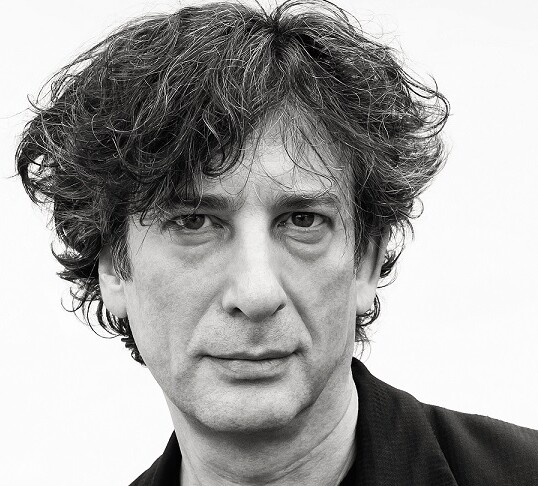 Neil Gaiman wearing black jacket