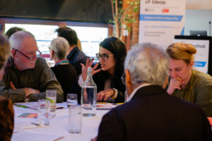 People sitting at a table and having a discussion