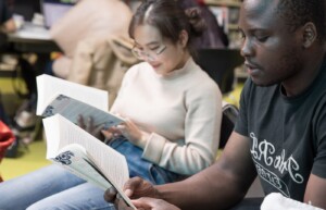 Two young people reading